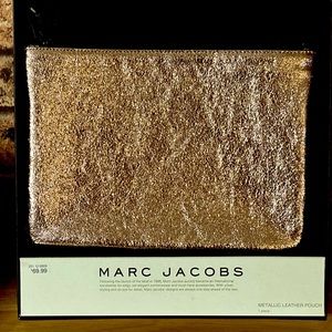 NEW never used Marc Jacobs/ Target/ Neiman’s rose gold leather pouch/ clutch